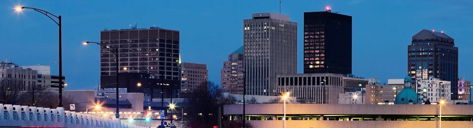 Cityscape with street lights on at dusk | Extermital Termite & Pest control serving Dayton, OH
