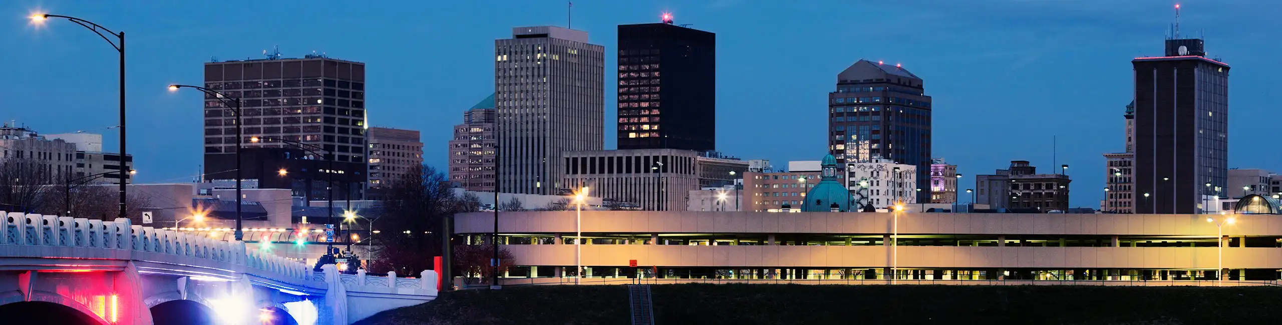 Cityscape with street lights on at dusk | Extermital Termite & Pest control serving Dayton, OH